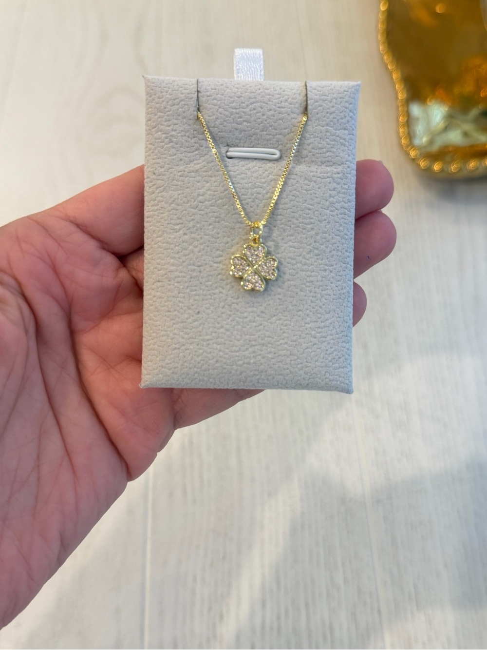 Gold Tone Four-Leaf Clover Pendant Necklace - Sparkling Crystal Accent